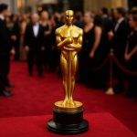 Golden Oscar-style award on a red carpet