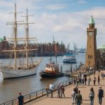 Hamburg harbor with ships and historic warehouses